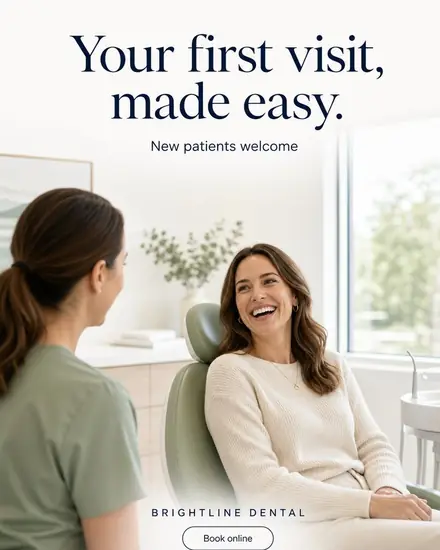 Dental clinic ad, patient laughing in the chair, headline 'Your first visit, made easy.'