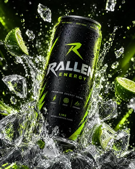 Energy drink can bursting through ice and splashes